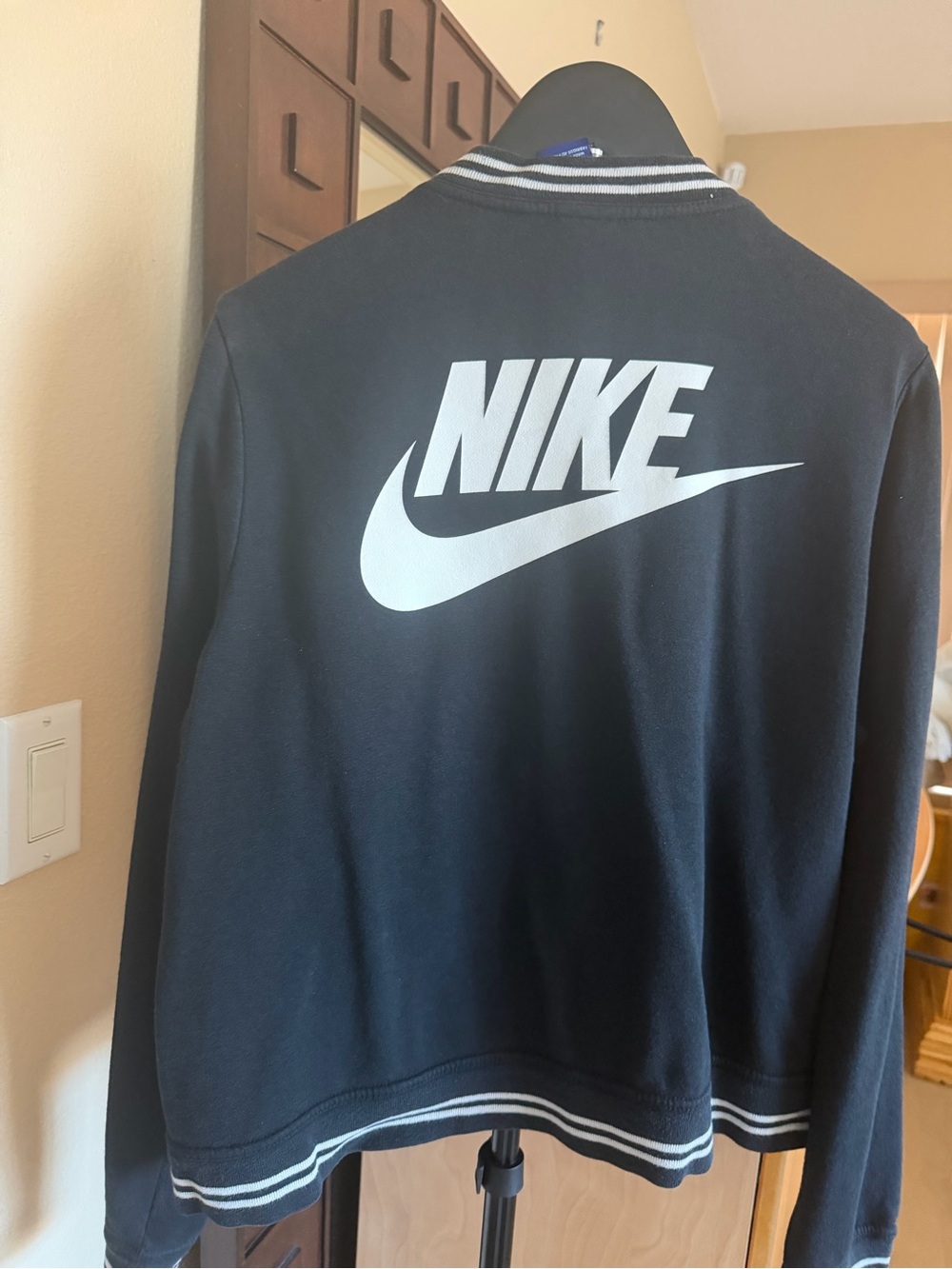 Nike Black Bomber Jacket with White Swoosh Logo